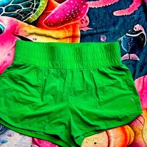 Green athletic shorts